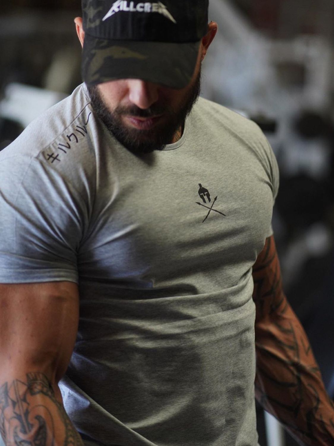 Men's plus size gray gym crew tee with athletic fit and graphic chest detail